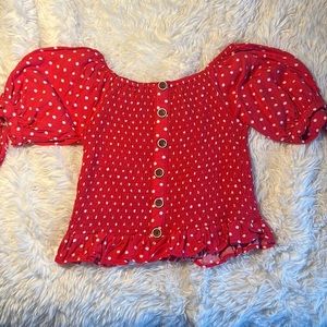 Ribbed blouse with white polka dots and buttons